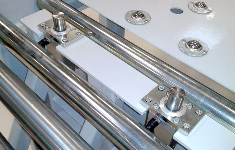 Rollenförderer mit pneumatischem senkrecht Stopper Rollenförderer senkrecht Stopper